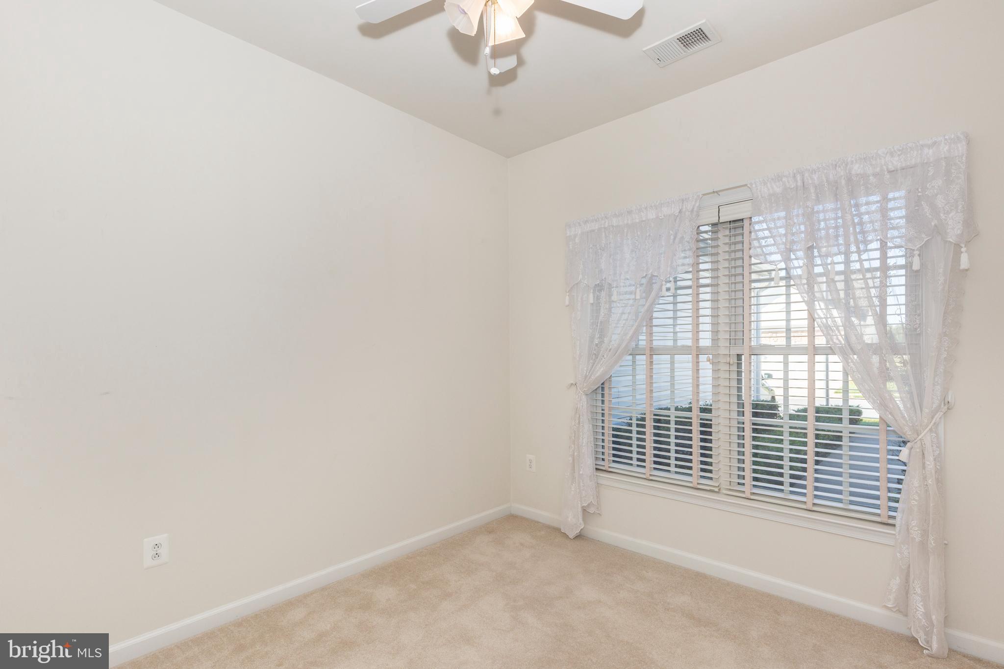 172 Saddletop Drive, Unit 364 Taneytown, MD 21787 - Photo 8 of 38 a view of an empty room with a window