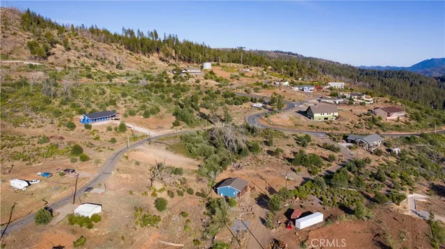 a view of lake with green space