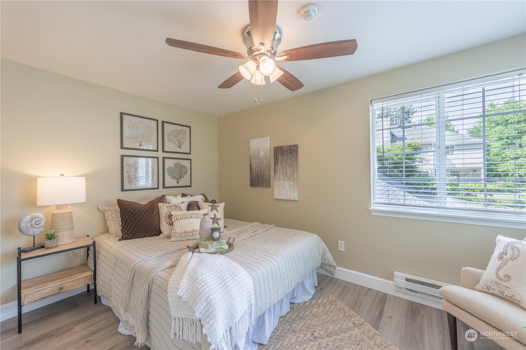 10909 Avondale Road Northeast, Unit M149 Redmond, WA 98052 - Photo 11 of 22 a bedroom with a bed and a window