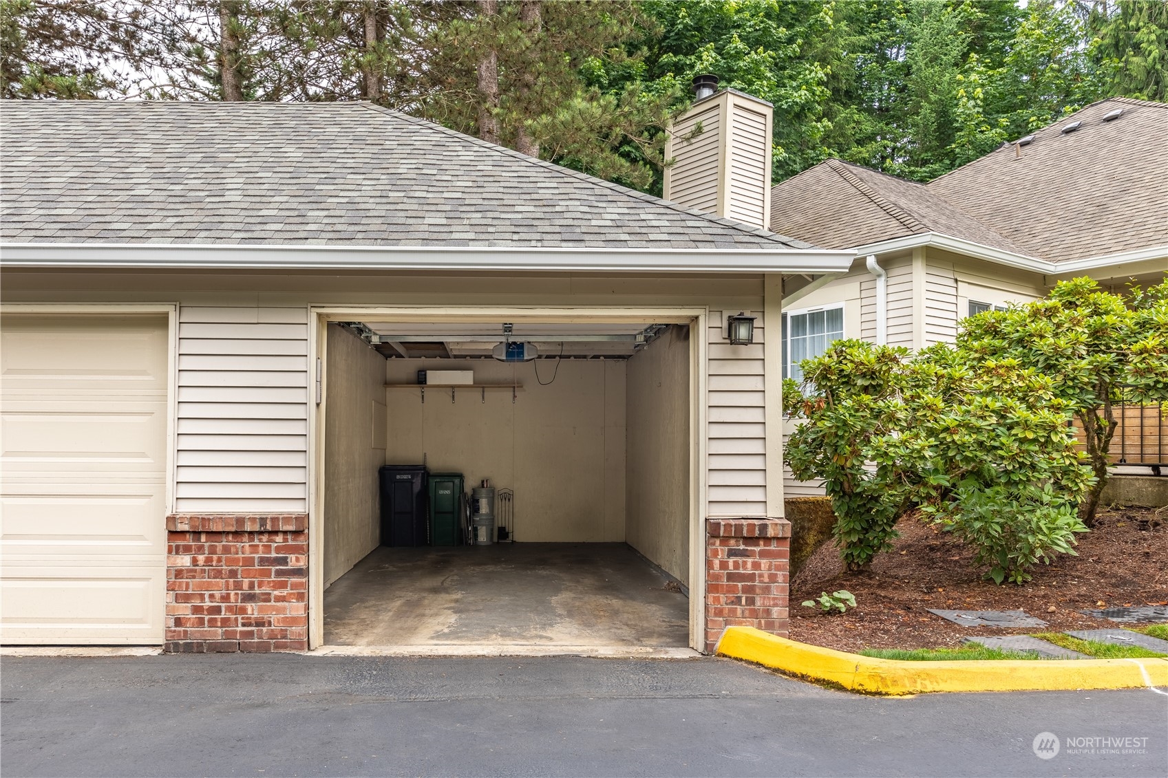 10909 Avondale Road Northeast, Unit M149 Redmond, WA 98052 - Photo 20 of 22 a view of a house with tub