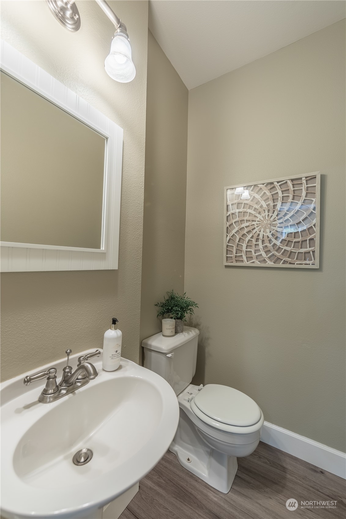 10909 Avondale Road Northeast, Unit M149 Redmond, WA 98052 - Photo 10 of 22 a bathroom with a sink mirror and toilet