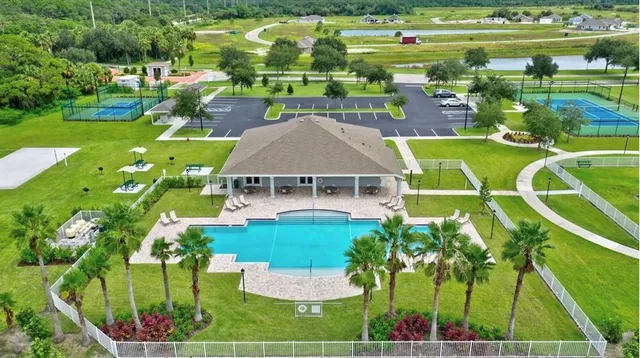 a view of a house with a big yard