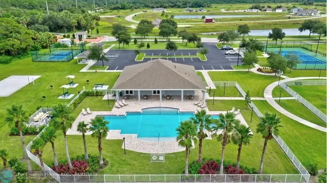a view of a house with a big yard