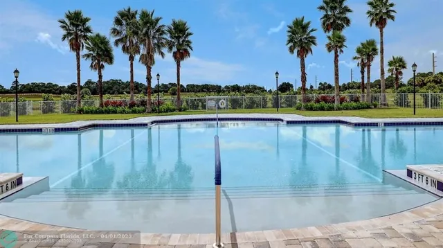 a view of a swimming pool and a terrace