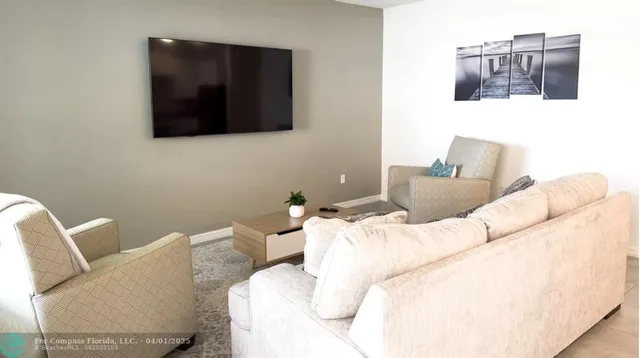 a bedroom with a bed and couch