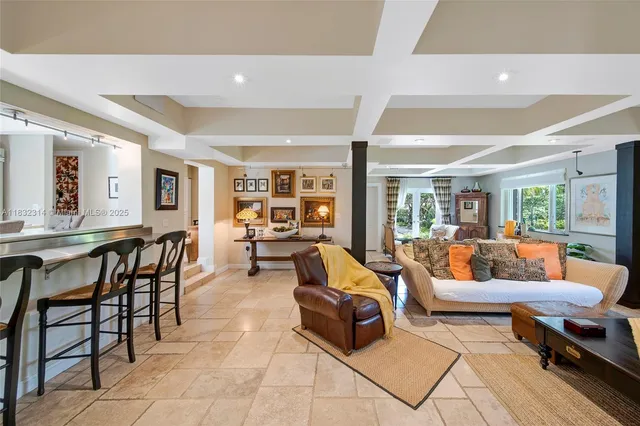 a living room with furniture and a table
