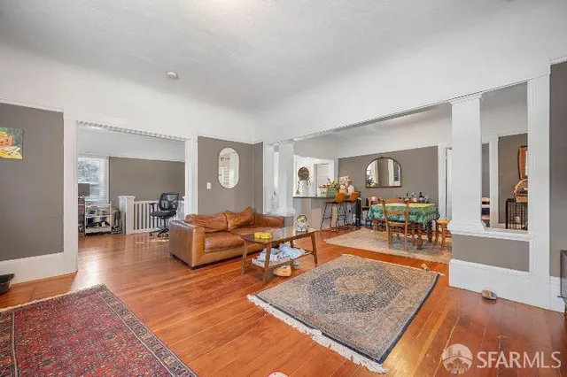 a bed room with a bed and a chair