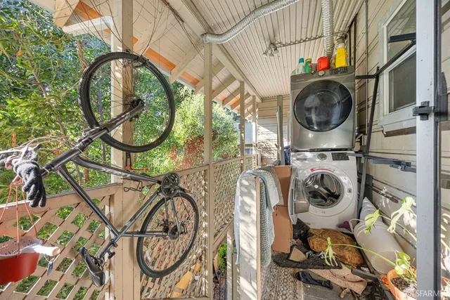 a view of a swimming pool with a yard and plants
