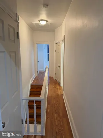 a view of a livingroom with wooden floor