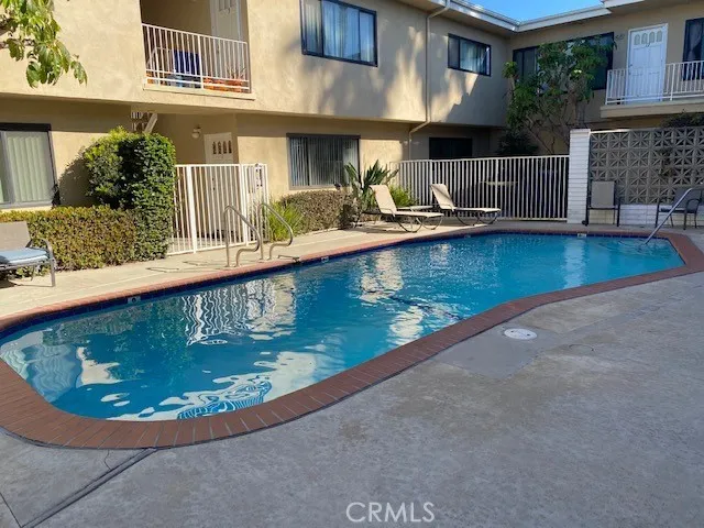 a view of a swimming pool with a sitting space