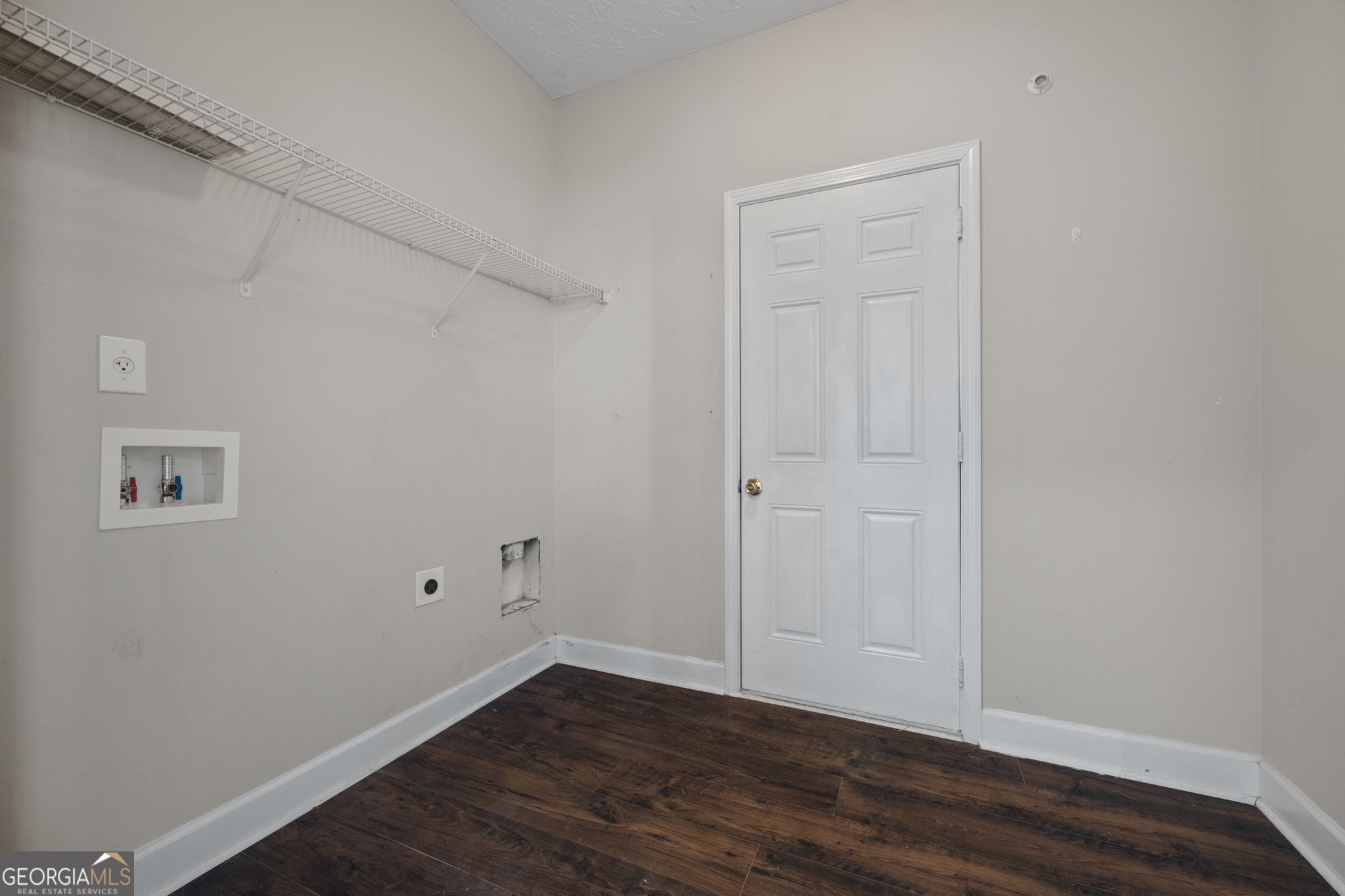 35 Timber Lane Newnan, GA 30265 - Photo 20 of 51 a view of an empty room with wooden floor