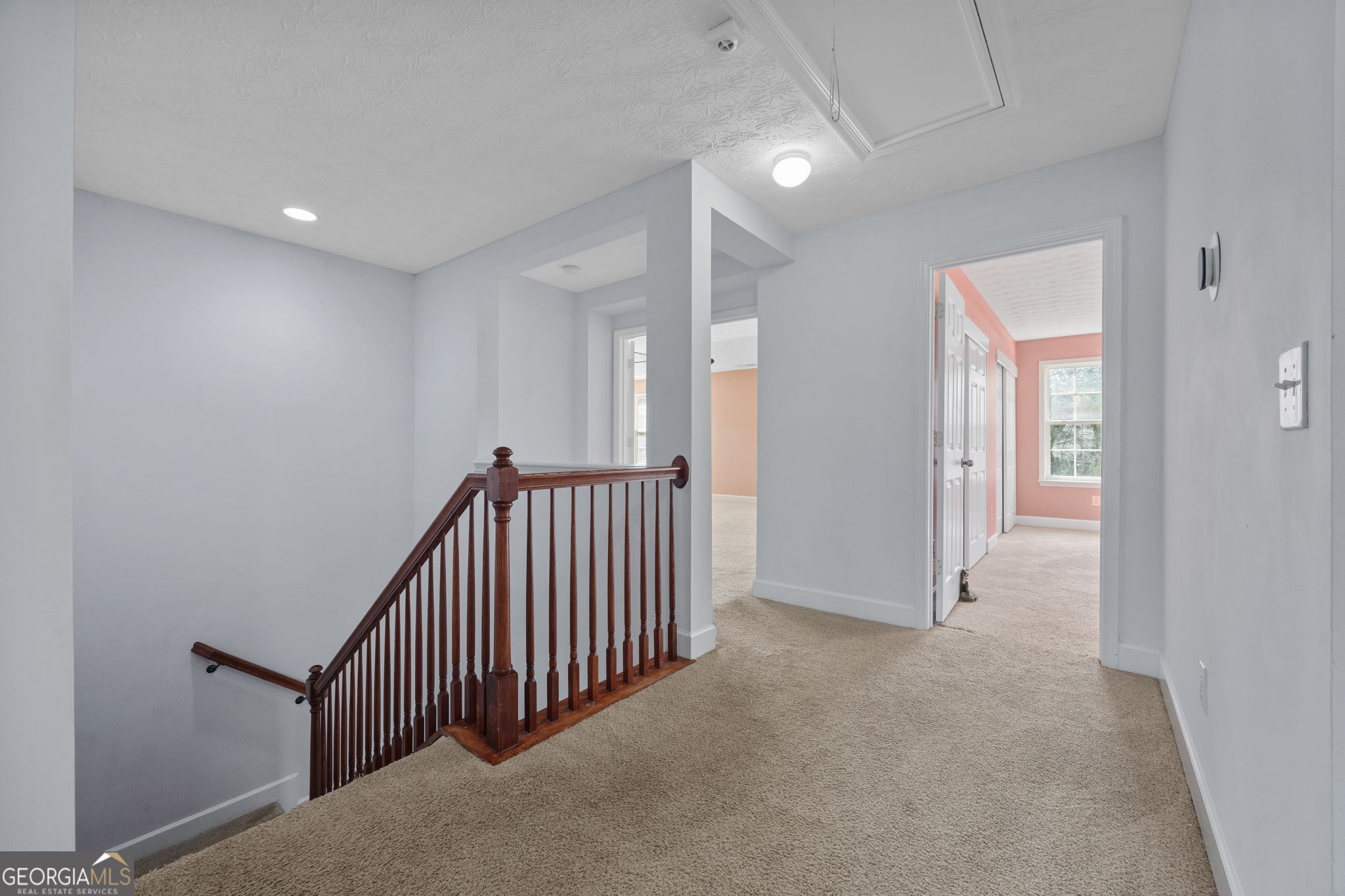 35 Timber Lane Newnan, GA 30265 - Photo 28 of 51 Hallway upstairs providing access to 4 bedrooms and main hallway bathroom.