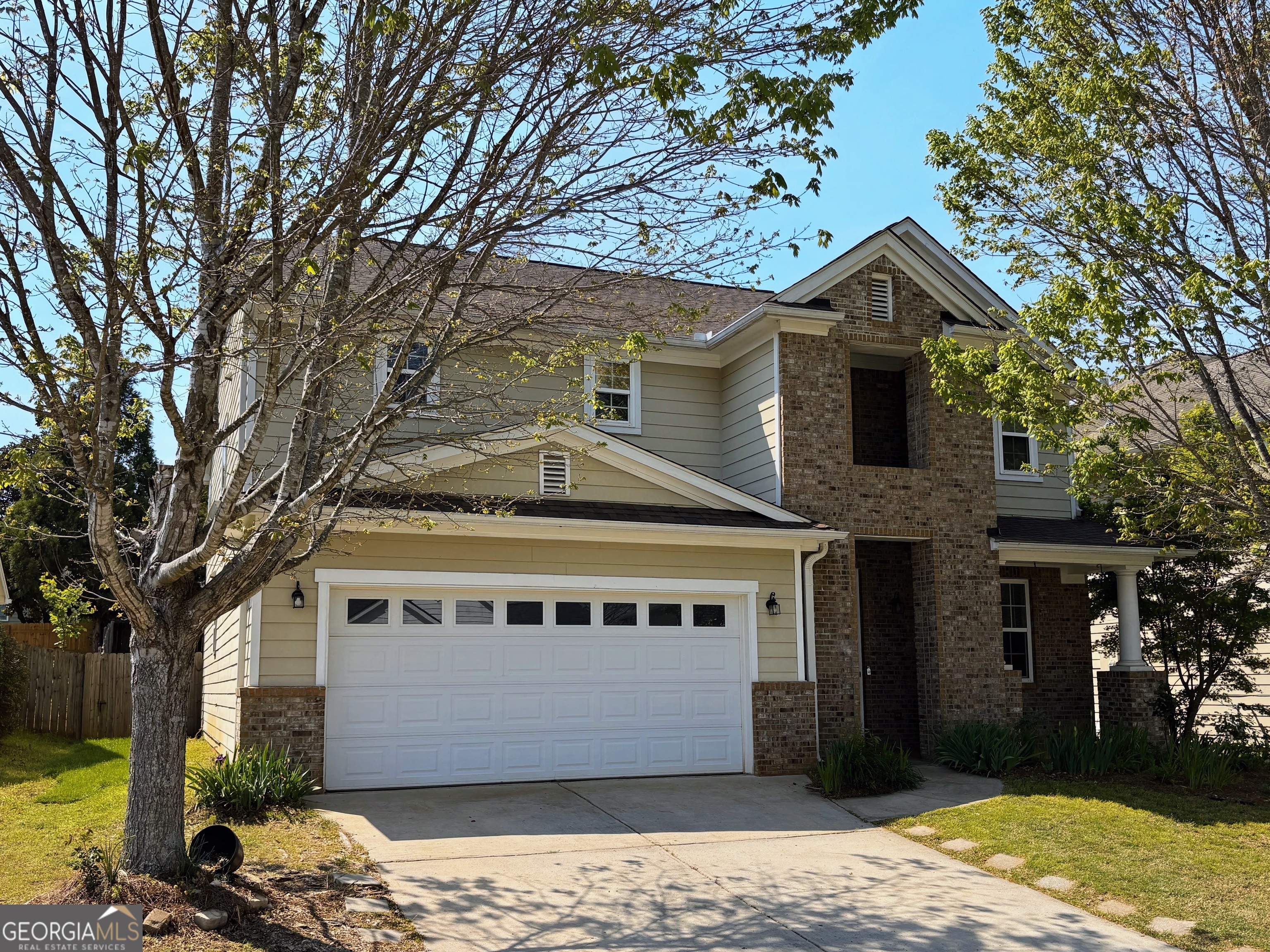 35 Timber Lane Newnan, GA 30265 - Photo 4 of 51 a front view of a house with a yard