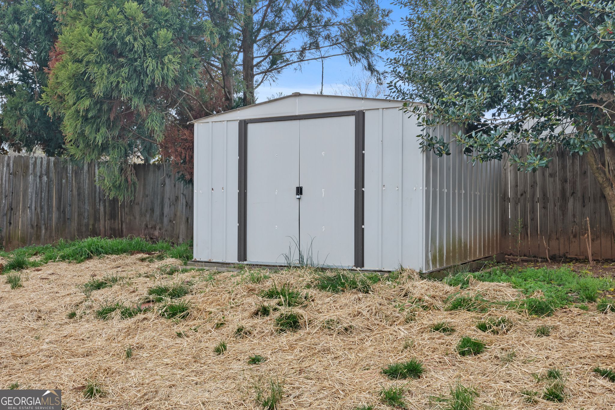 35 Timber Lane Newnan, GA 30265 - Photo 47 of 51 Backyard shed for tool and toy storage.