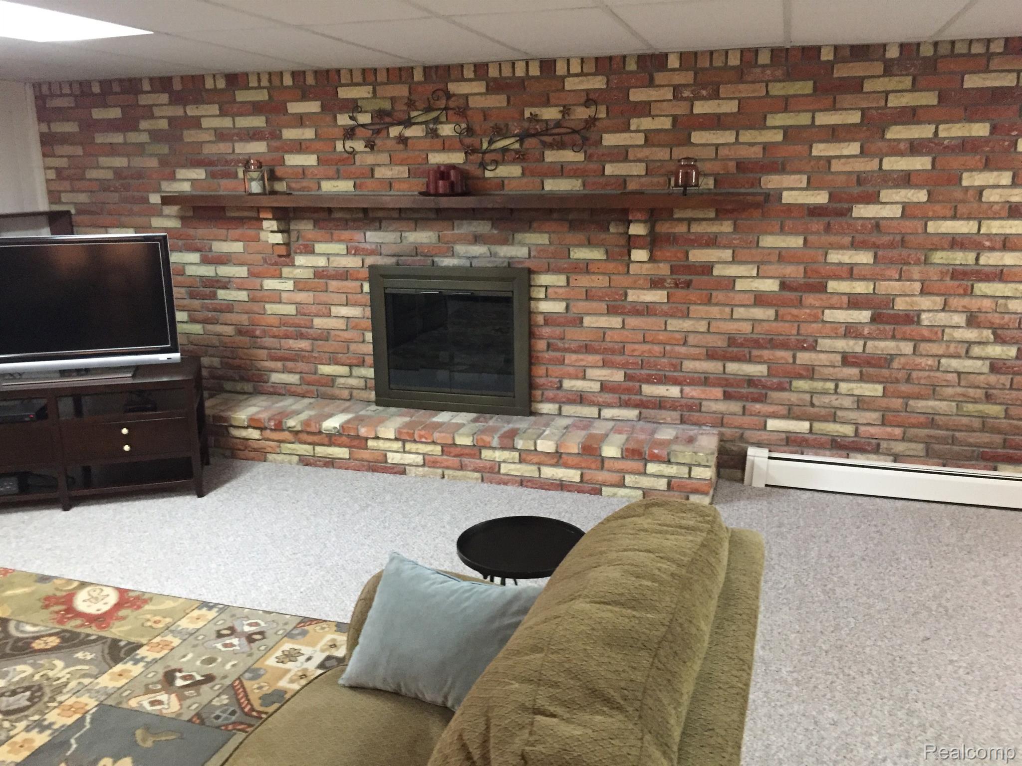 5657 Cribbins Road Avoca, MI 48006 - Photo 34 of 66 Fireplace in Family