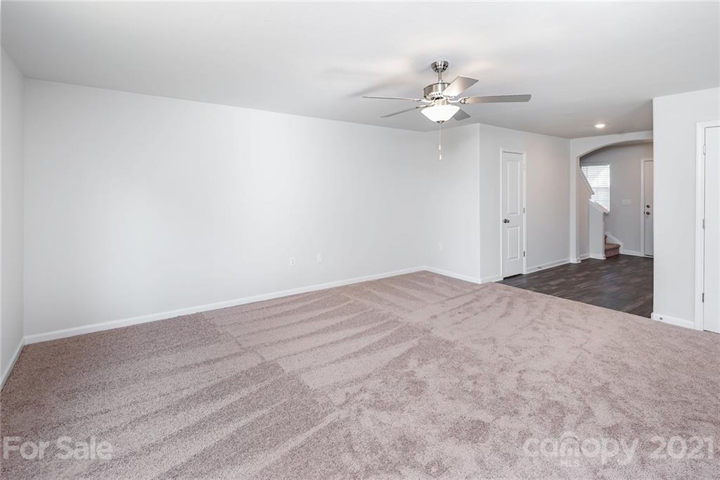 281 Rosedale Street Kings Mountain, NC 28086 - Photo 2 of 19 a view of a livingroom with a ceiling fan and window