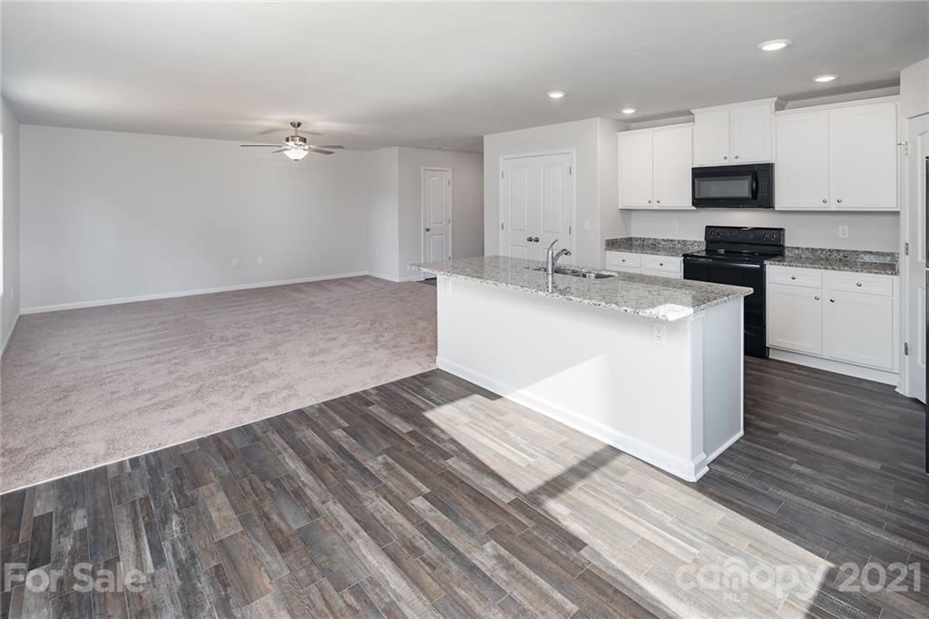 281 Rosedale Street Kings Mountain, NC 28086 - Photo 4 of 19 a large kitchen with cabinets