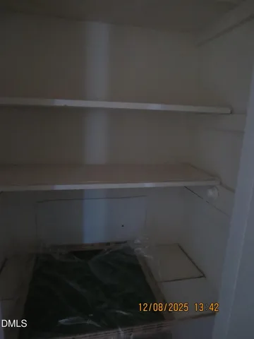 a view of a room with racks on the wall