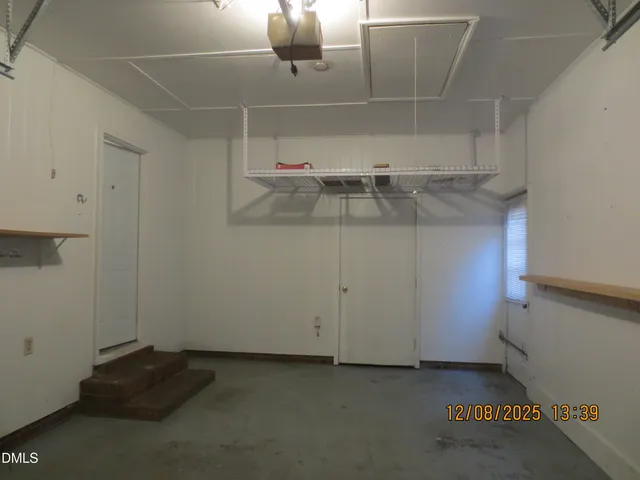 a view of a room with racks on the wall