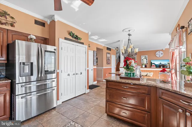 a living room with furniture window and wooden floor