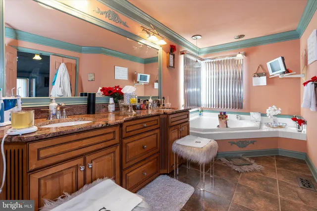 a view of a white house with large windows