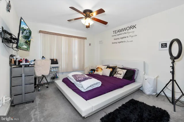 a view of a street with a building in the background