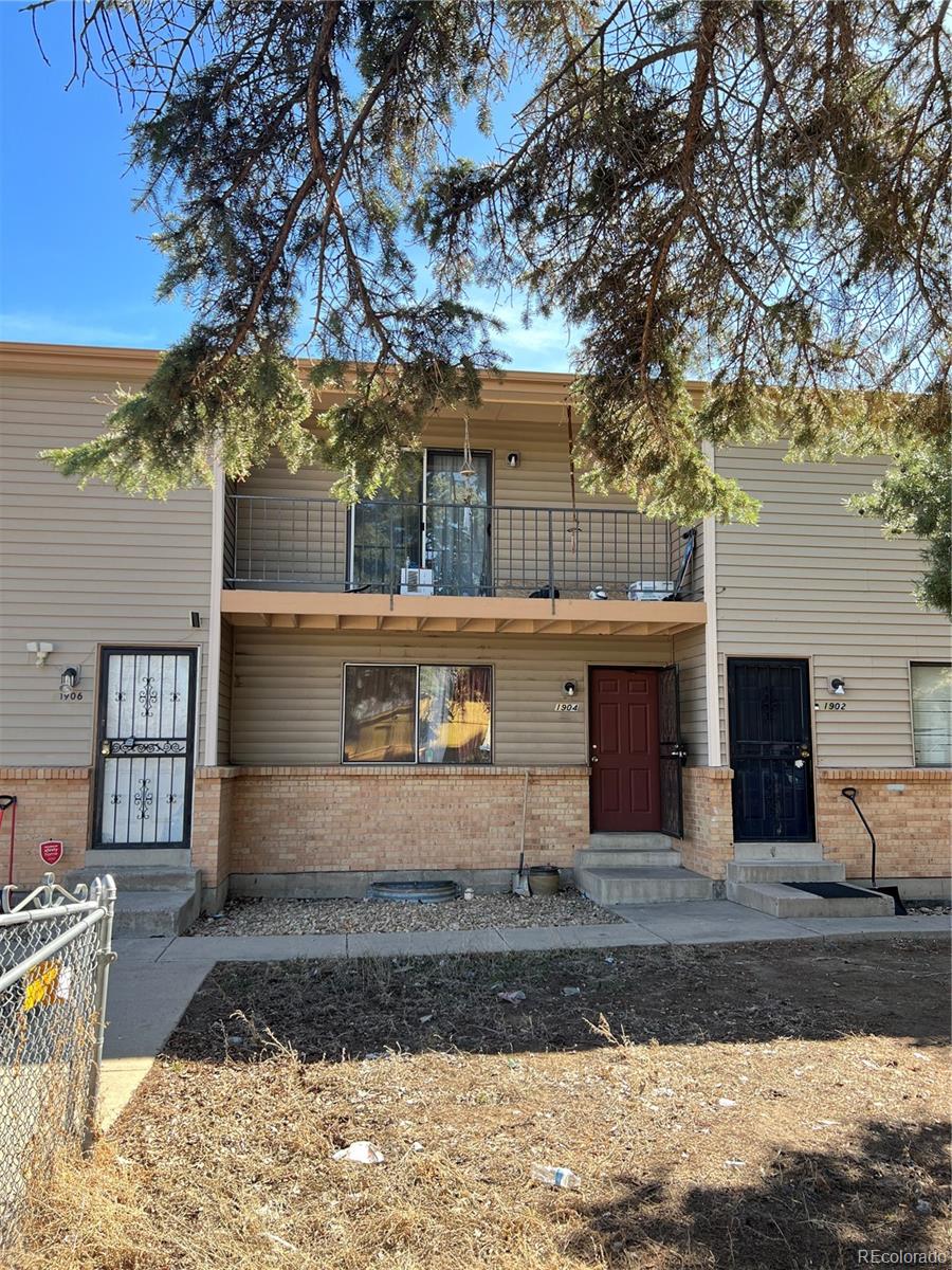 1904 Eagle Street Aurora, CO 80011 - Photo 1 of 27 a view of house with outdoor space