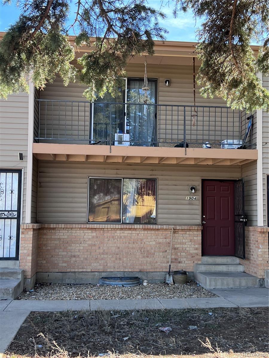 1904 Eagle Street Aurora, CO 80011 - Photo 27 of 27 a front view of a house