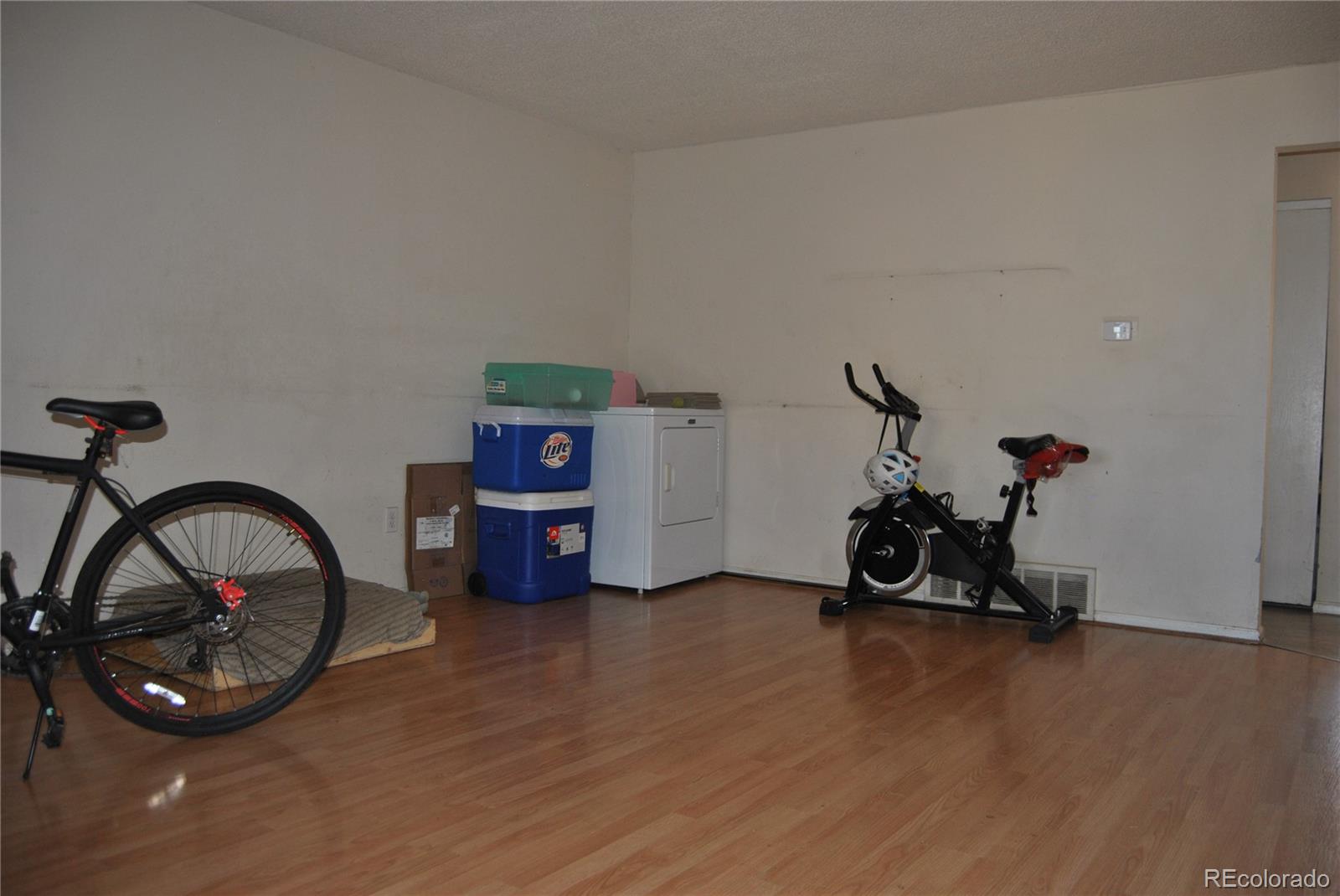 1904 Eagle Street Aurora, CO 80011 - Photo 6 of 27 a view of a room with gym equipment