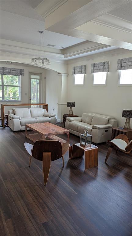 6264 Wingspan Way Bradenton, FL 34203 - Photo 12 of 27 a living room with furniture wooden floor and window