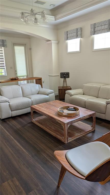 6264 Wingspan Way Bradenton, FL 34203 - Photo 8 of 27 a living room with furniture a rug and a window