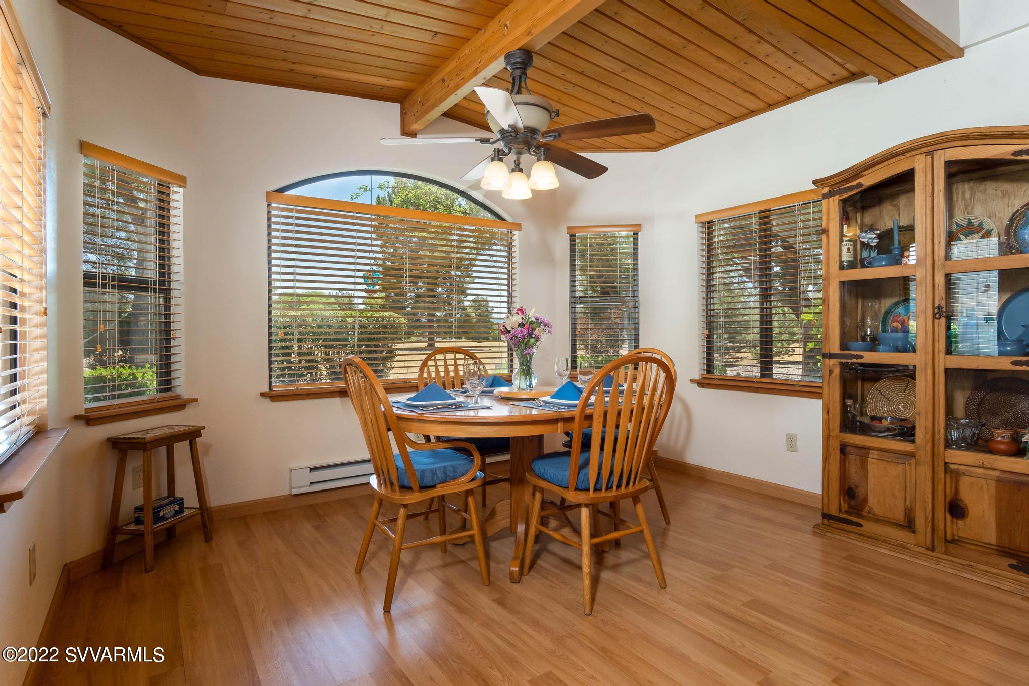 3685 East Rimrock Drive Rimrock, AZ 86335 - Photo 16 of 47 a dining room with furniture window wooden floor