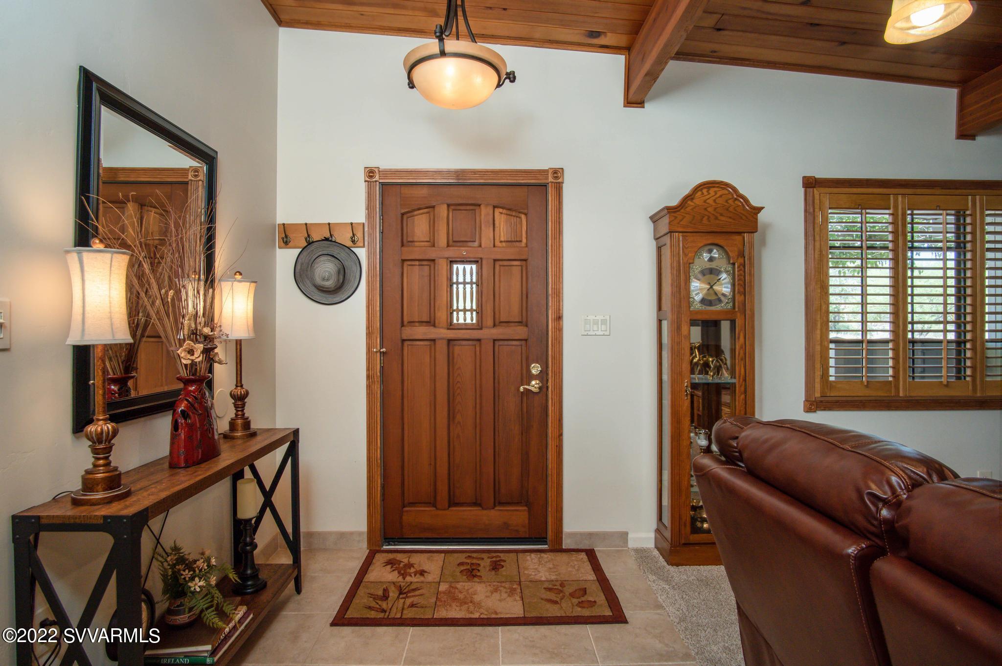 3685 East Rimrock Drive Rimrock, AZ 86335 - Photo 8 of 47 a living room with furniture a flat screen tv and a window