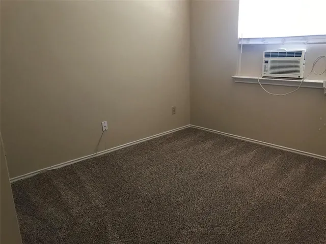 a view of a backyard with a barn