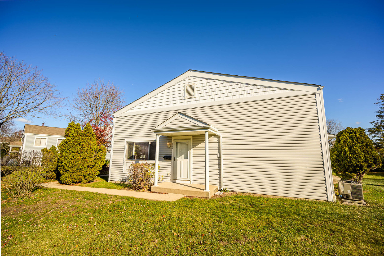 a house that has a window in front of it
