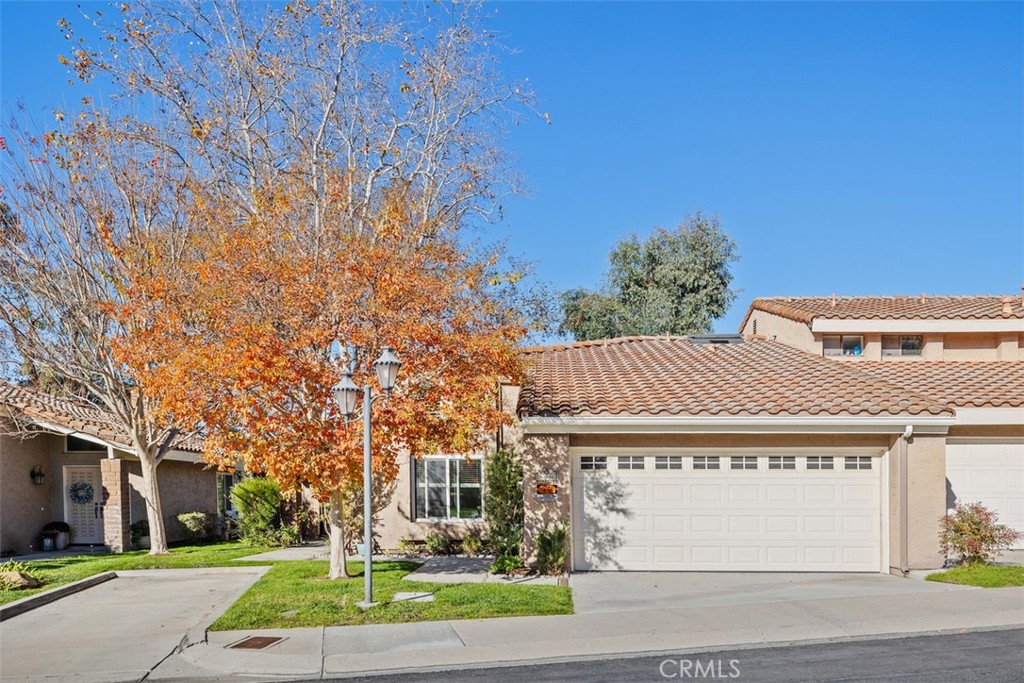 6401 East Nohl Ranch Road, Unit 74 Anaheim Hills, CA 92807 - Photo 1 of 1 front view of house with a street
