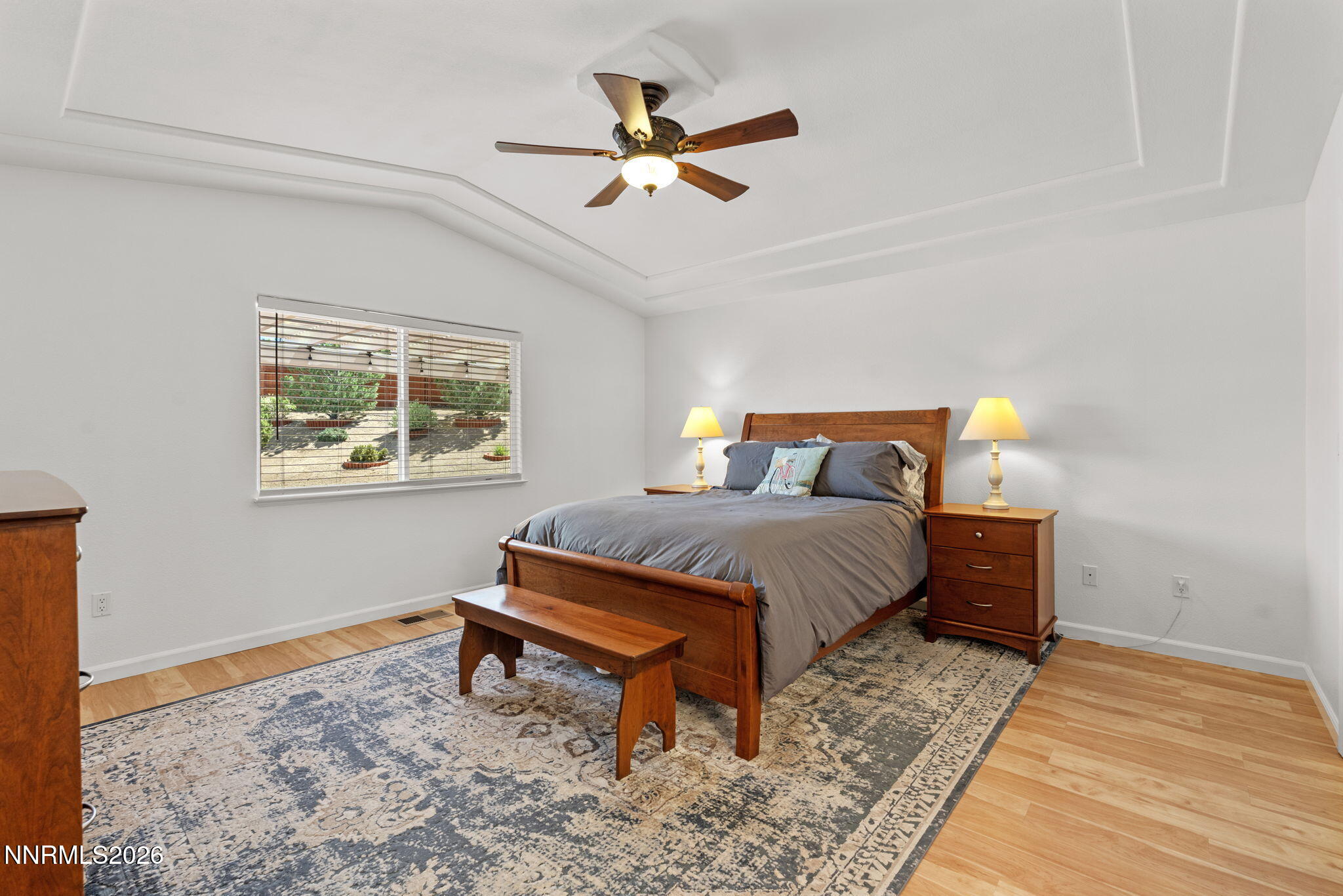 18324 Panda Bear Court Reno, NV 89508 - Photo 14 of 44 a bedroom with a bed and window