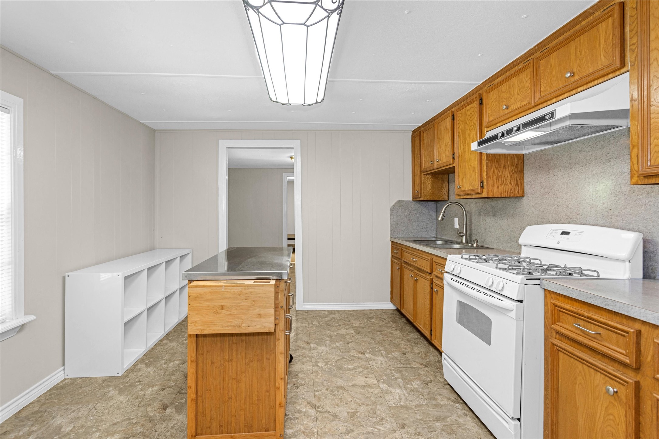 99 Main Street Huntsville, TX 77340 - Photo 13 of 47 Great flow from the kitchen to dining space.