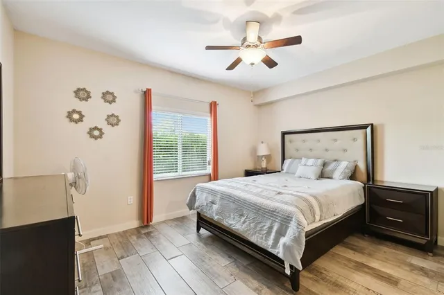 a view of a hallway with a wooden floor