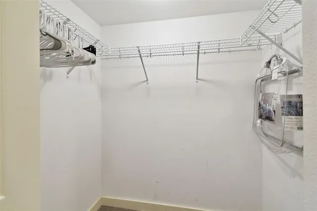 a view of livingroom with hardwood floor and ceiling fan