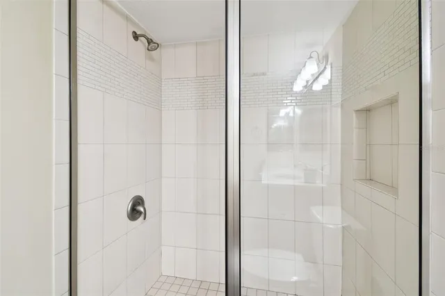 a backyard of a house with lots of green space and trees