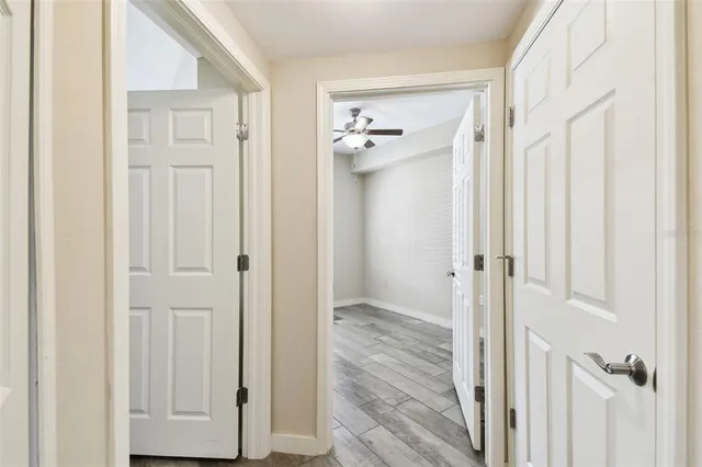 a front view of a house with a garden and plants