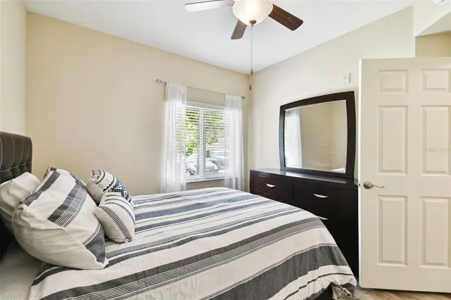 a swimming pool with outdoor seating and yard