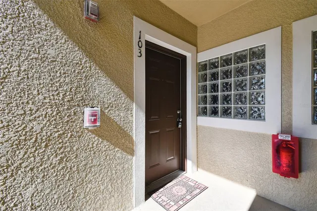 a kitchen with granite countertop cabinets and steel stainless steel appliances