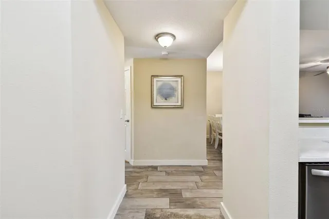 a kitchen with stainless steel appliances a sink stove and microwave