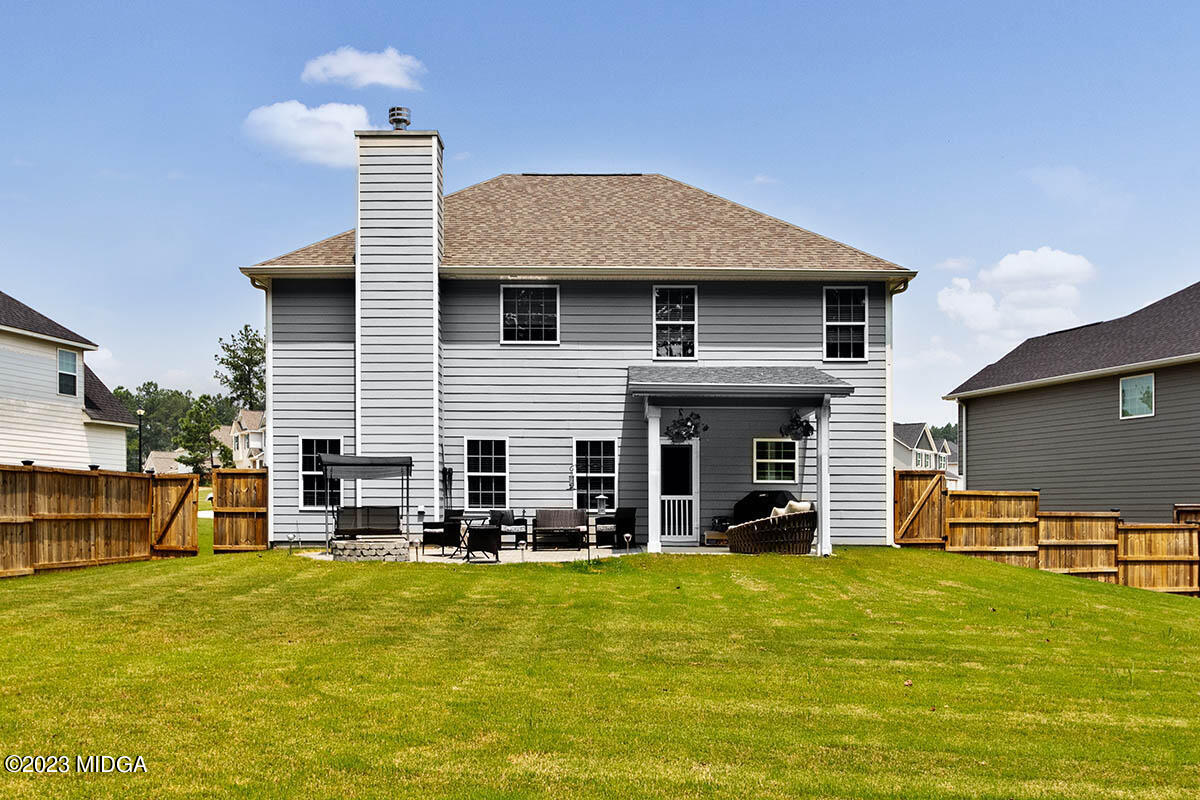 4227 Cornwall Drive Forsyth, GA 31029 - Photo 24 of 27 a front view of a house with patio