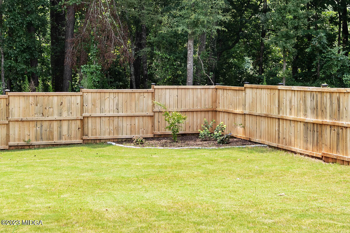 4227 Cornwall Drive Forsyth, GA 31029 - Photo 25 of 27 a view of a backyard with fence