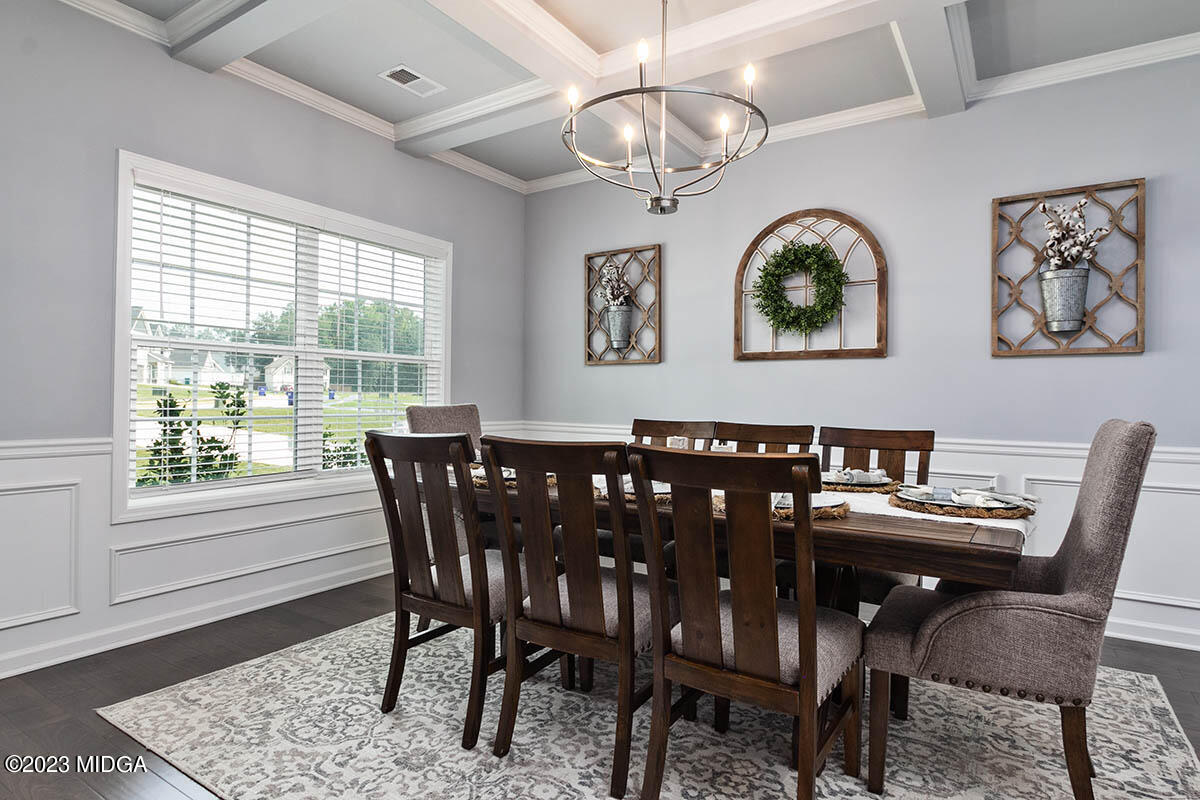 4227 Cornwall Drive Forsyth, GA 31029 - Photo 4 of 27 a view of a dining room with furniture window and wooden floor