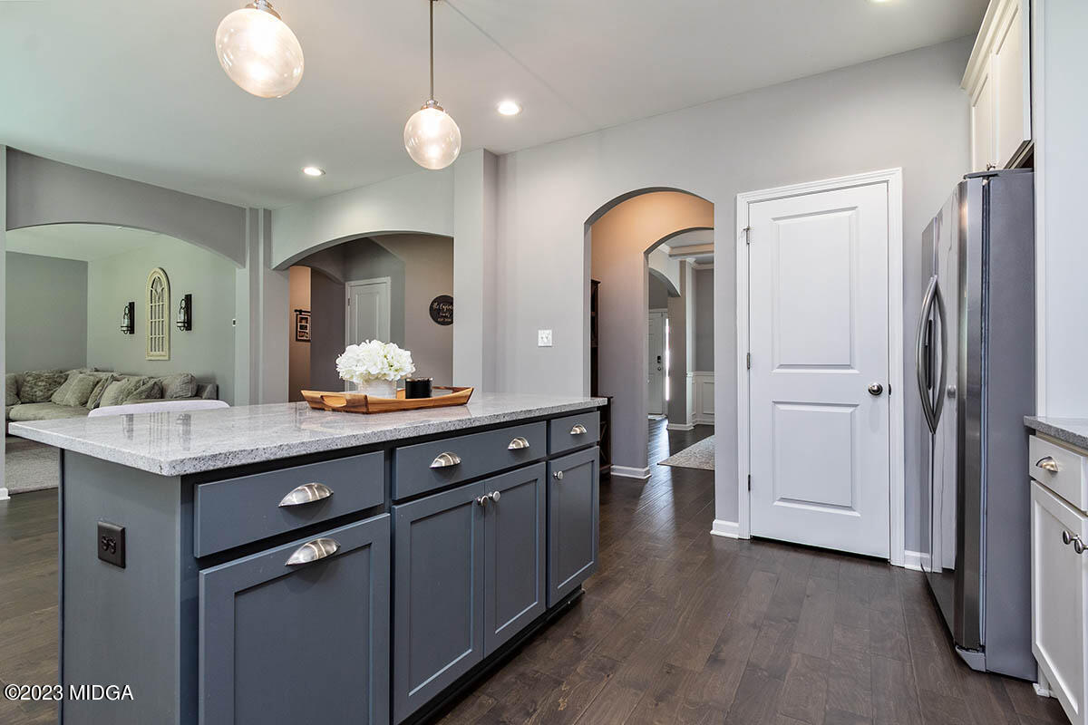 4227 Cornwall Drive Forsyth, GA 31029 - Photo 7 of 27 a bathroom with a double vanity sink and a mirror