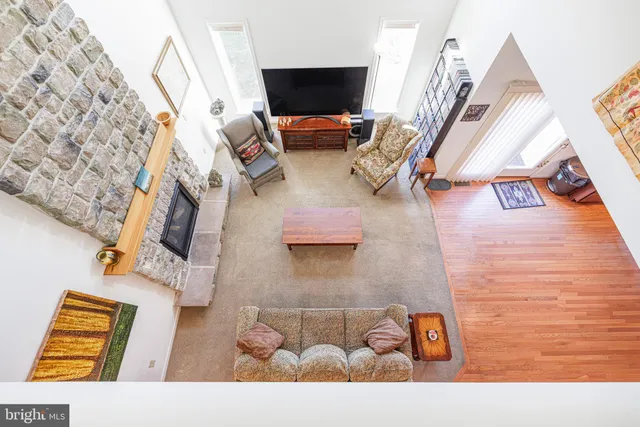 a view of living room with furniture and flat screen tv